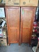 Two storage cupboards (one missing handle) and glassware contents