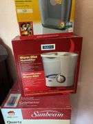 Sunbeam large room heater, Sunbeam small room heater and ReliOn warm mist humidifier