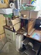 Desk, file cabinet and drawer full of stained glass making items