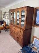 Kraus Furniture Amana walnut hutch with 4 glass doors on top, 5 drawers and 4 door base 22D x 66L x 73H NO CONTENTS, needs to  be a LATE PICK UP TIME!!