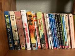 LOTS of paperback books 3 shelves