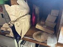 Desk, file cabinet and drawer full of stained glass making items