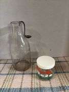 Half gallon milk bottle and cream spoon and painted jar