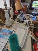 Grab bag lot includes lamps, papers, canister, iron, shoe stretchers, etc