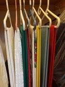 9 hangers of table linens