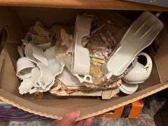Clear glass and white glass waiting to be hand painted, wreathes for decorating, etc