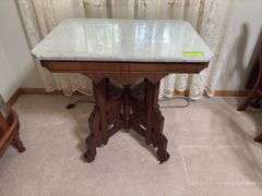 Antique Eastlake style marble top walnut parlor table with original porcelain casters 22 x 30 Per Seller inventory, top was cut from the countertop of old Norway bank