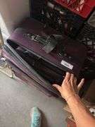 Set of two purple, soft side, Samsonite suitcases