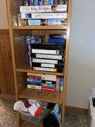 12D x 12L x 72H shelf unit w/ VHS movies, RC car, slot car track and 3 slot cars