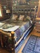 QUEEN sized knotty pine bed frame with mattress box spring and linens