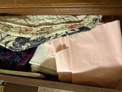 Lots of kitchen linens, plus candles, cups etc...