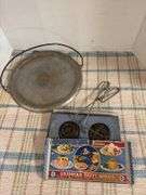 Aluminum griddle and Griswold Patty Molds, box in bad shape