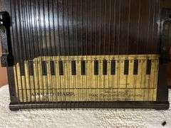 2 stringed musical instruments, Apollo Harp and another similar one