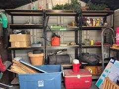 Back wall of garden storage shed - pair of steel ramps, stepstool, cooler, misc - shelving units are not included