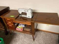 Elna sewing machine in walnut stand 18D x 36L x 31H