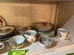 Lots of cute knick knacks and cups & saucers (We don’t know if they match!)