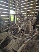 Misc scrap iron, steel wheels, implement seats, pliers shear, separator base