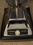 Two vacuums-Hoover Elite and Sanitaire heavy duty