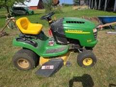 John Deere L100 riding mower 42" deck, SN 100Aa141171, hood broken, runs and mows