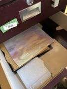 Four drawer cabinet with lots of glass to make stained glass