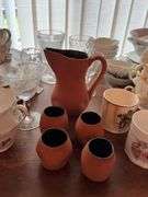Small knee hole desk and assorted stemware, dishes etc...