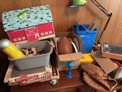 Children’s toys include board games, wooden dominoes, football, ball glove, Sunnyfield Farms barn and more