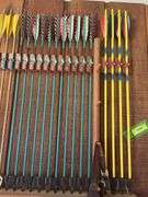 36 +/- mostly wood shaft traditional arrows and large quiver