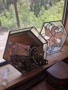 Decor in window - stained glass, trinket boxes, vase