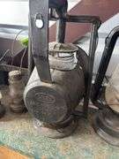 Two Dietz lanterns and two small skaters lanterns