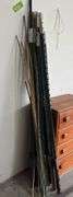 12 T-posts and bamboo garden stakes