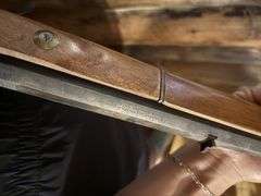 Connecticut Valley Arms Inc. Black powder rifle - has been used as a decorative wall hanger