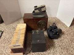 Box camera, binoculars, old radio, view master slides of national parks etc..