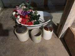 Large enamel tub with artificial flowers, two brown top jugs and a small crock