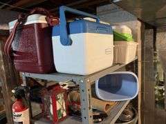 Metal shelf and contents includes vinyl tape, coolers of all sizes, security light, file box, etc