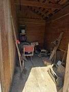Grapple hay forks, old car tires (3pr), steel wheel, hand crank sheep shear head, old steel baby crib, primitive homemade stilts