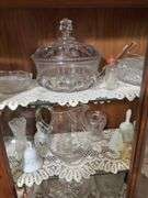 All in china cabinet includes glass bells, vases,  pitcher, hand painted bowls and more