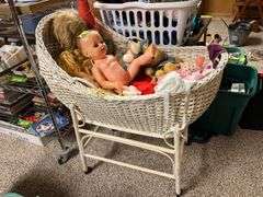 Old and older dolls, bassinet and stand