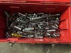 Red toolbox with tools