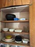 Plastic mixing bowls with lids, dishes, drawer of flatware, glassware, small CorningWare casseroles, etc