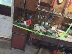 Small rolling tool box and tools as shown on left half of bench and wall