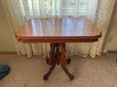 Antique walnut parlor table with original porcelain casters 20 x 31