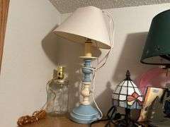 Five table lamps with winter themed base and three others