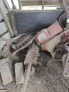 Misc scrap iron, steel wheels, implement seats, pliers shear, separator base