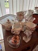 Small knee hole desk and assorted stemware, dishes etc...