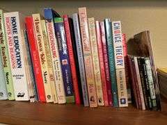 3 shelves of books and magazines Please see photos