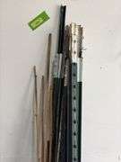 12 T-posts and bamboo garden stakes