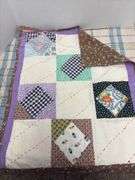 Wooden Dutch shoes and hand sewn doll quilt