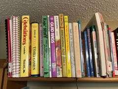3 shelves of books and magazines Please see photos
