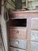 30 drawer pine cabinet w 4 missing drawers 18D x 32L x 59H