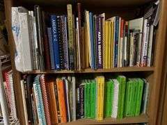 2 white metal shelf units, oak bookcase and LOTS AND LOTS of education materials BRING YOUR BOXES